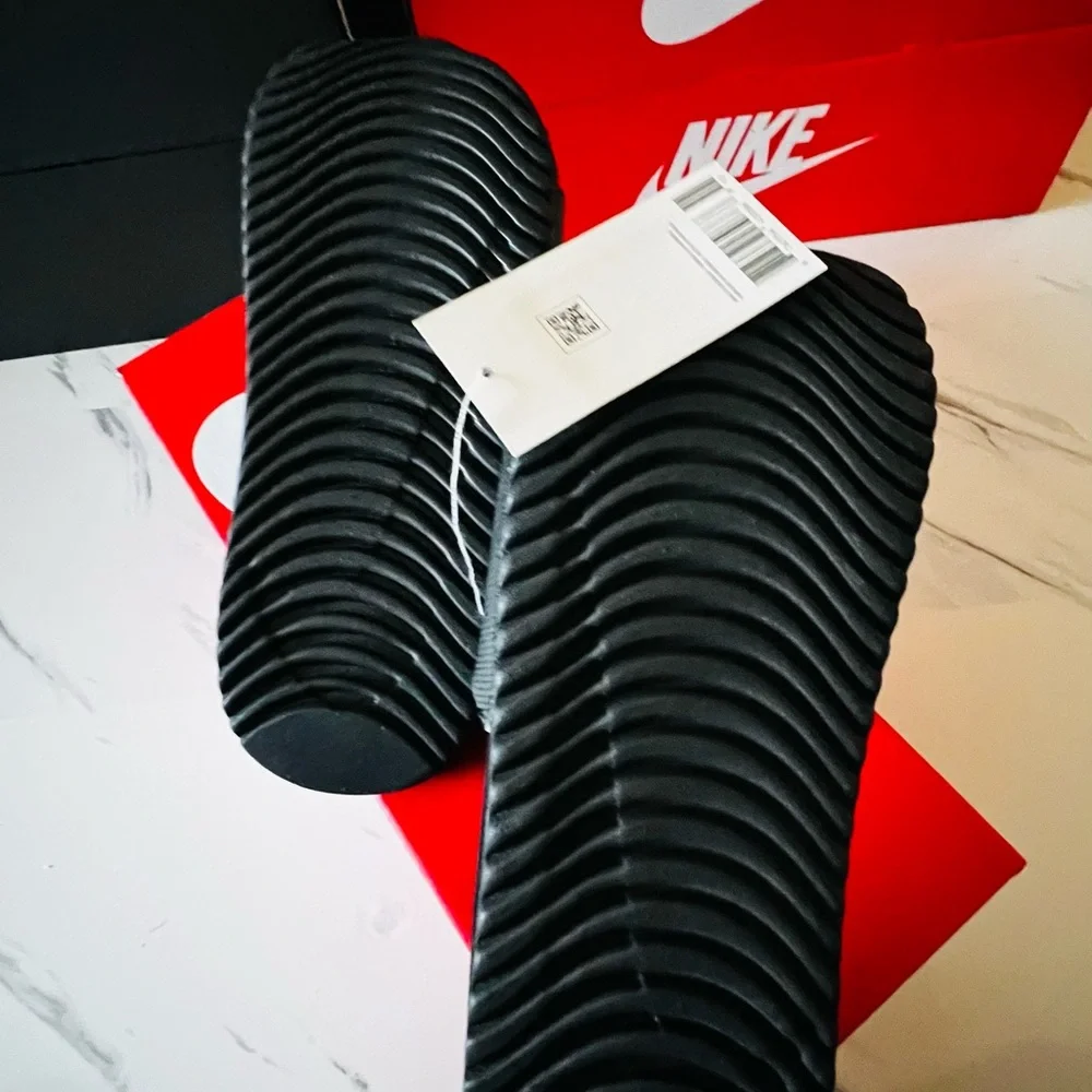 Nike Black and White Kawa Slides in Youth 1 Y